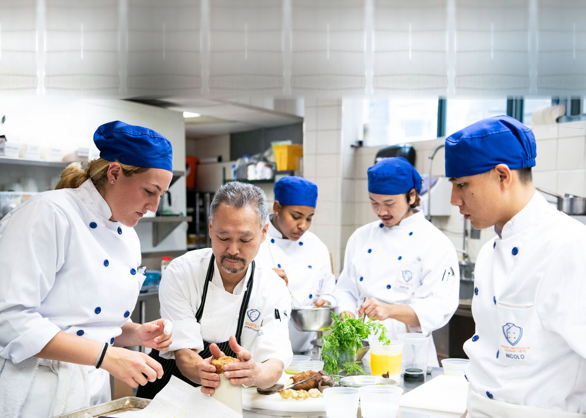 PICAchef students and chef instructor in a professional kitchen